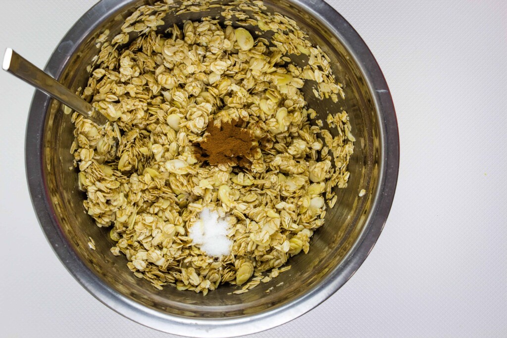 adding the cinnamon and salt and then adding the oil and honey mixture