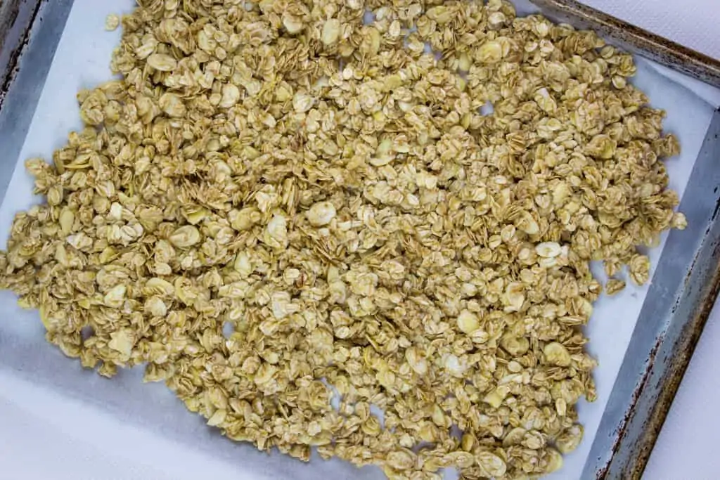 spread the mixed granola out on a parchment lined sheet pan