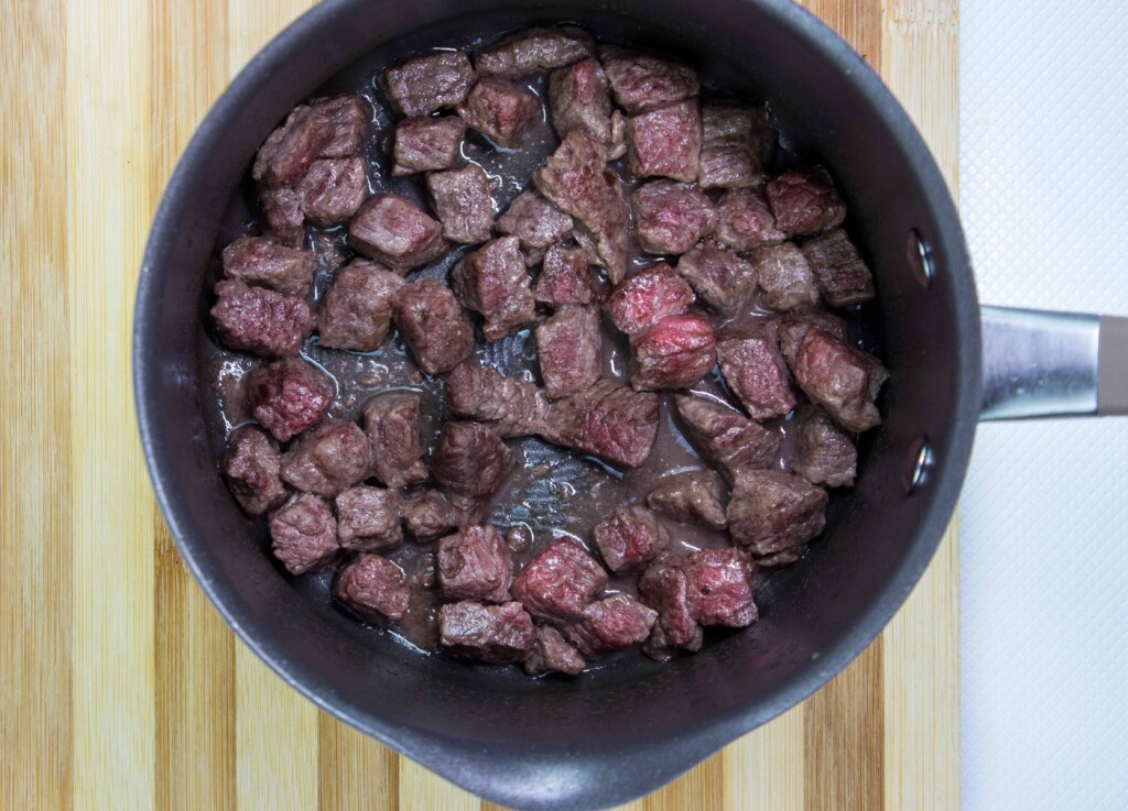 Brown the stewing beef in the soup pot to make the homemade beef & barley soup.