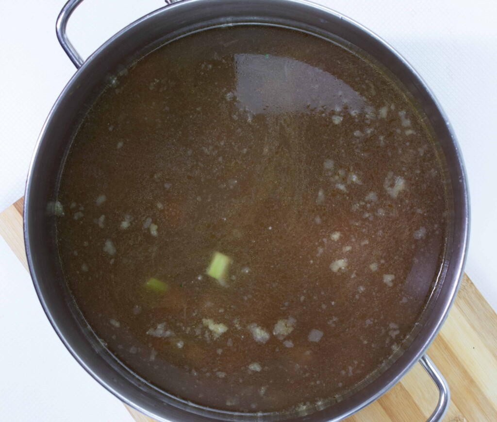 Beef stock added to the beef and veggies.
