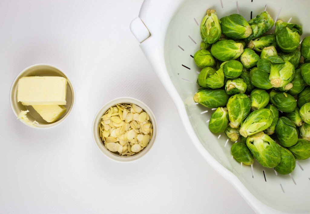 Ingredients to make brussels sprouts with almonds.
