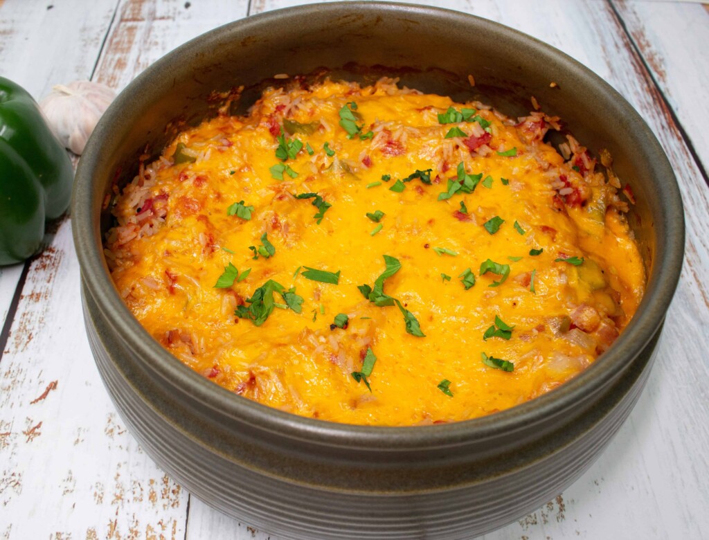cheesy spanish rice in a casserole dish ready for eating