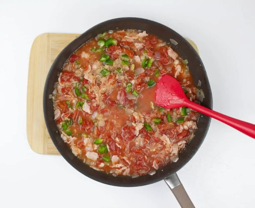 bringing the mixture to a boil in the skillet