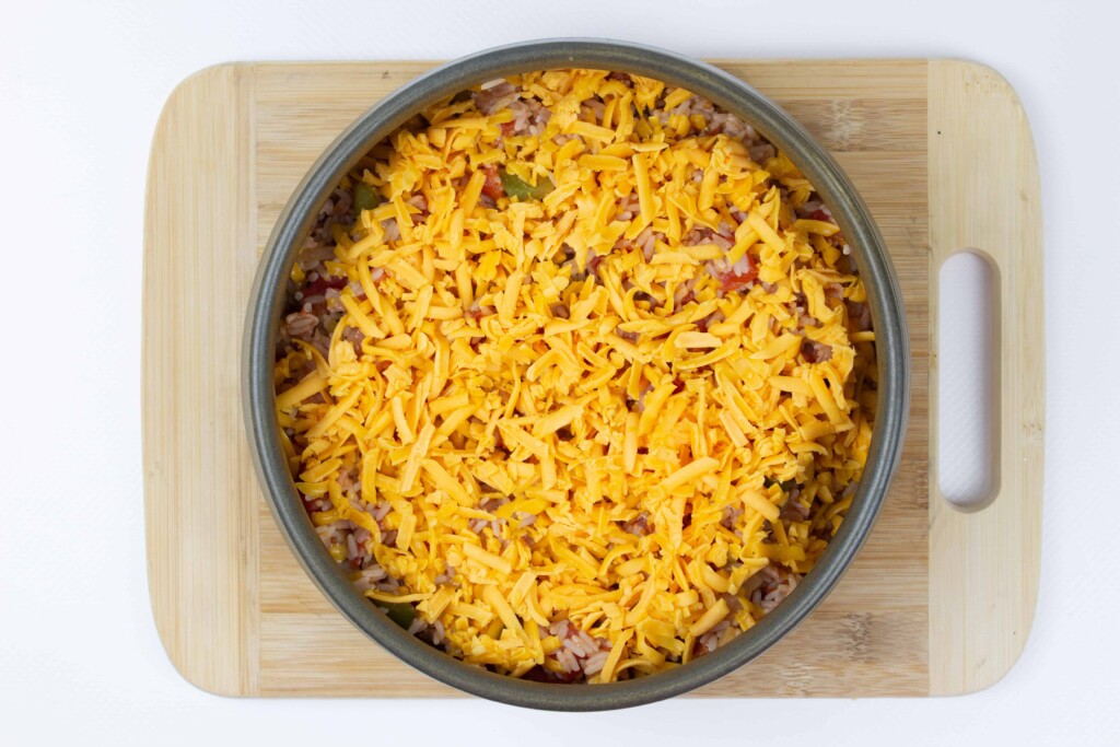 topped with cheddar cheese and ready for the last few minutes in the oven