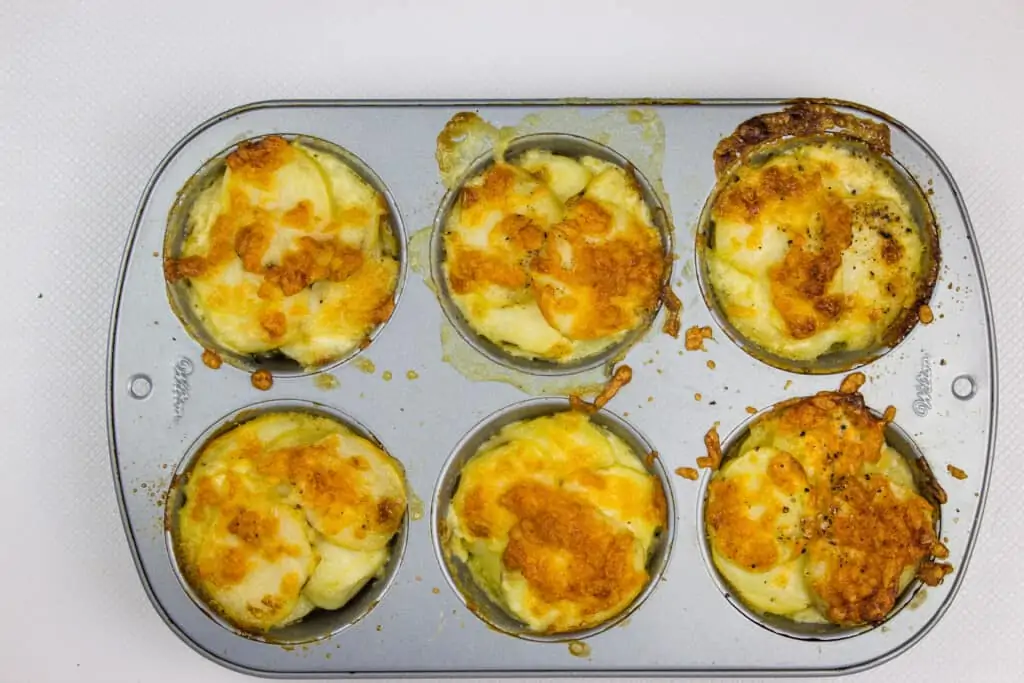 cheesy baked au gratin potatoes gruyere in the muffin pan