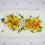 potatoes au gratin gruyere on a white platter