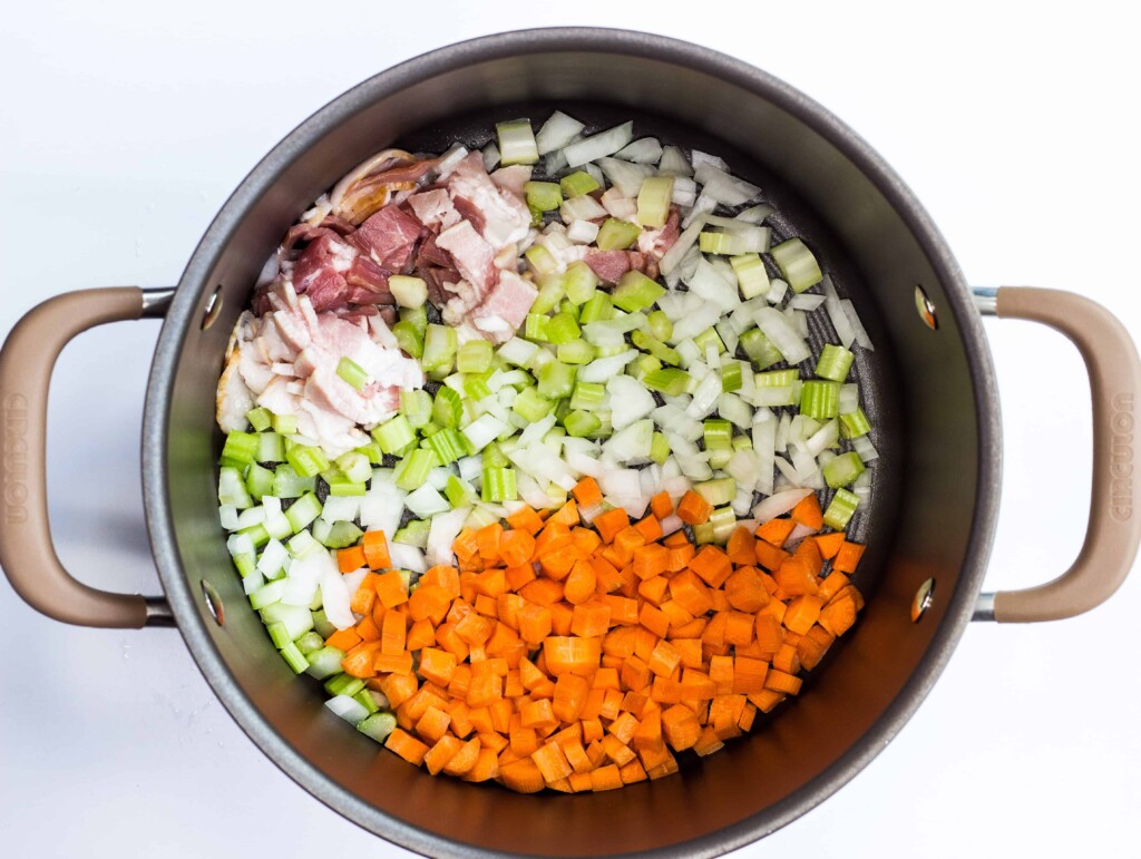 frying the bacon and the veggies