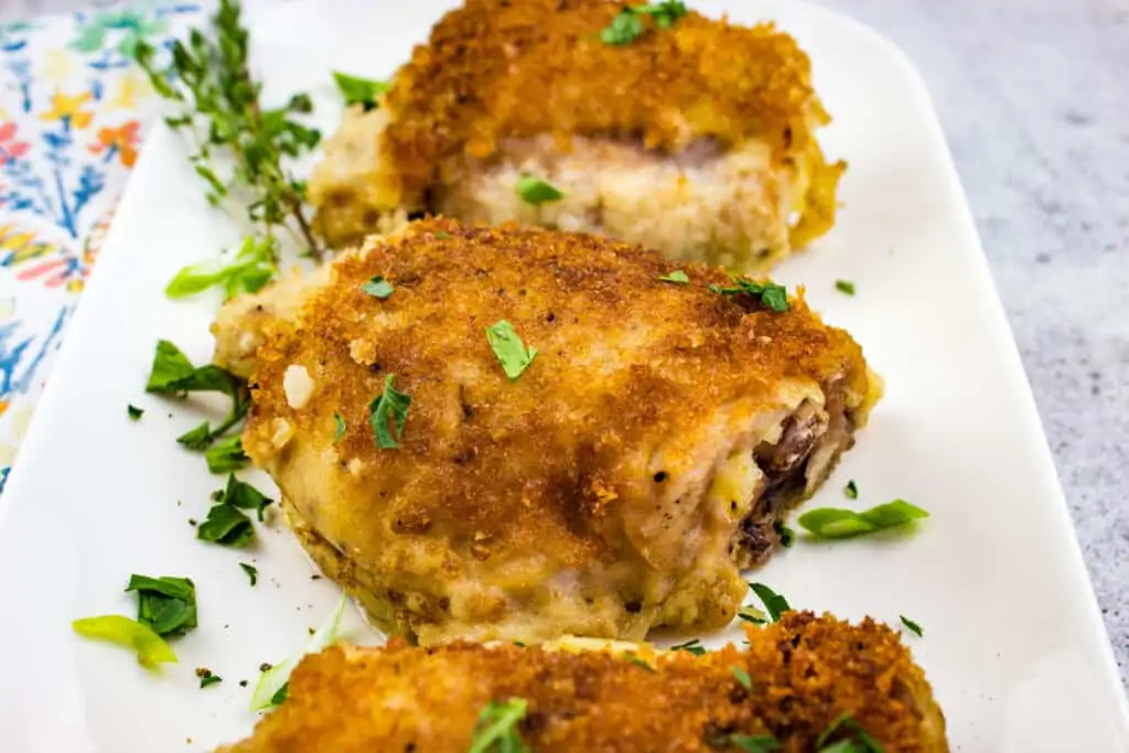 a closeup shot of oven baked chicken thighs on a platter