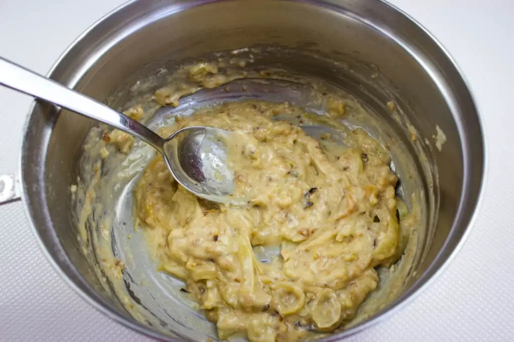 making a paste with the flour and drippings in a pot