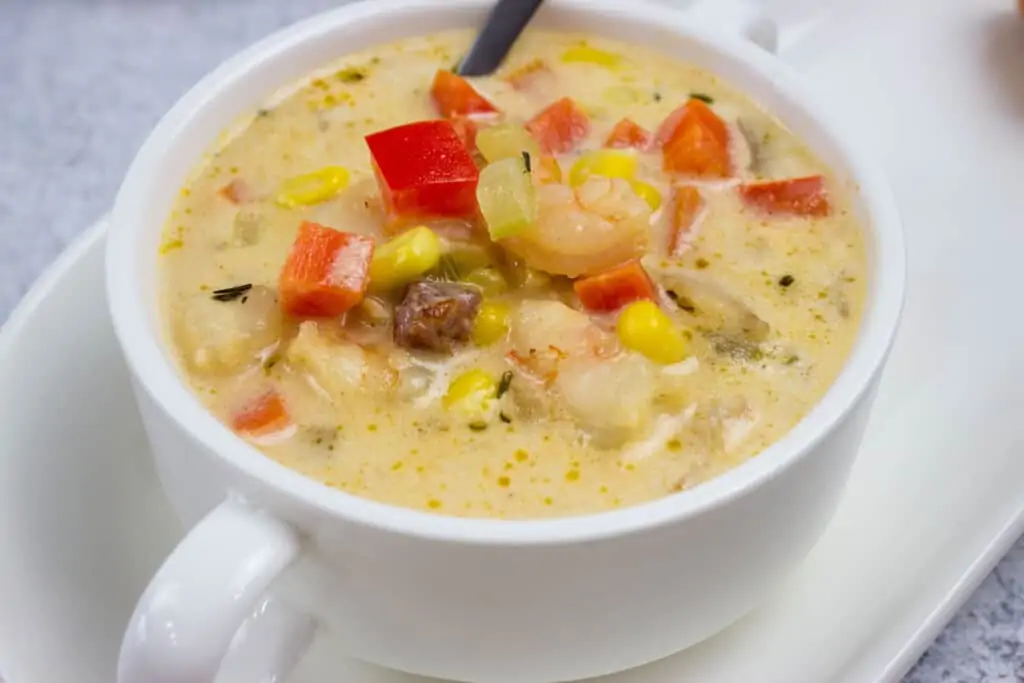 shrimp and corn chowder with chipotle in a soup bowl