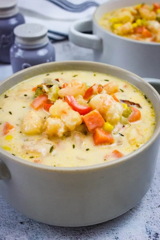 shrimp & corn chowder with chipotle in a bowl with a second serving in the background