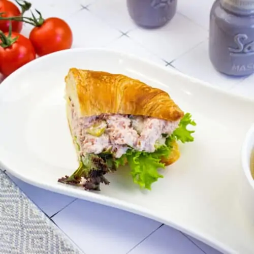 old fashioned ham salad on a croissant with soup