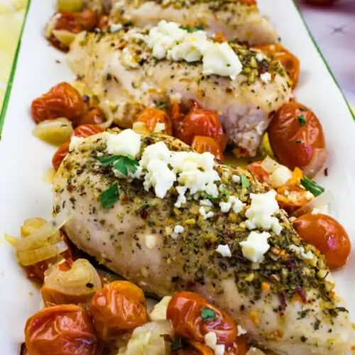 A closeup of Mediterranean Chicken Bake with Feta and Tomatoes