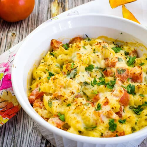 Baked pasta with ricotta and tomatoes in a casserole dish.