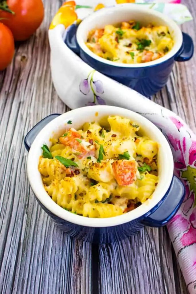 pasta with ricotta and tomatoes in individual size dishes