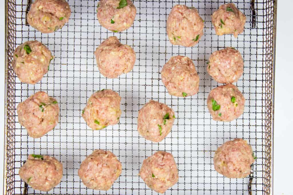mixture formed into ping pong size meatballs