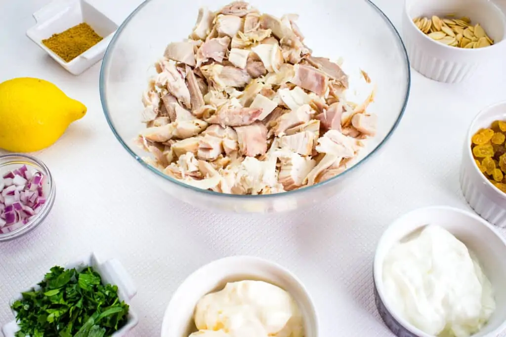 Ingredients to make curry chicken salad with raisins