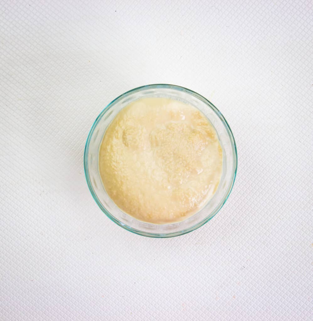 risen yeast in a small bowl