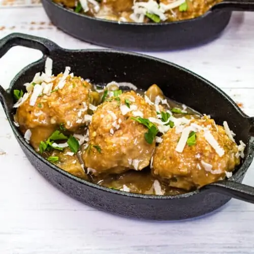 Chicken marsala meatballs in a small serving dish.