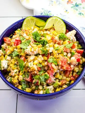 Mexican street corn salad in a blue bowl