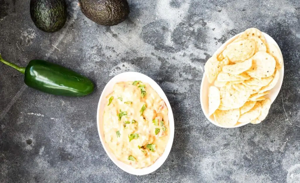 smoked queso in a small white dish