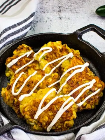 Corn Fritters in a black serving dish