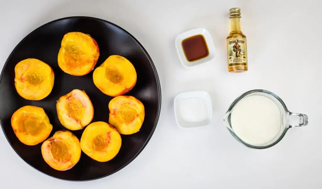cut peaches in half and sprinkle with sugar