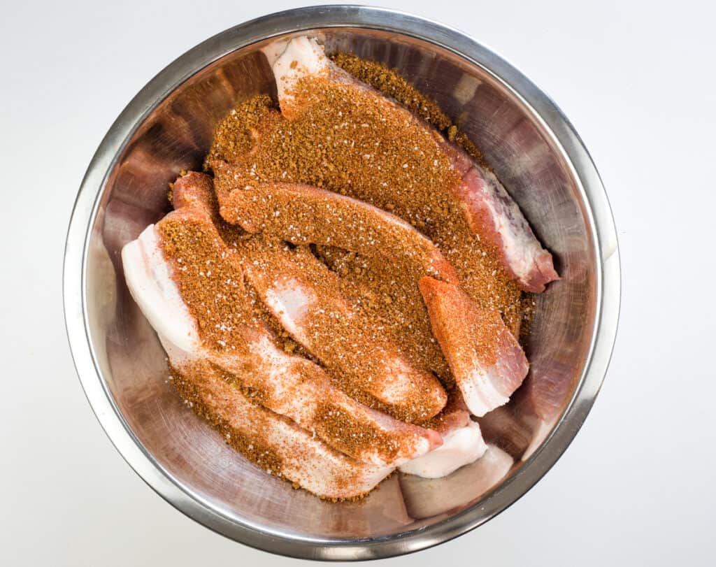 sprinkle the rub over the pork belly