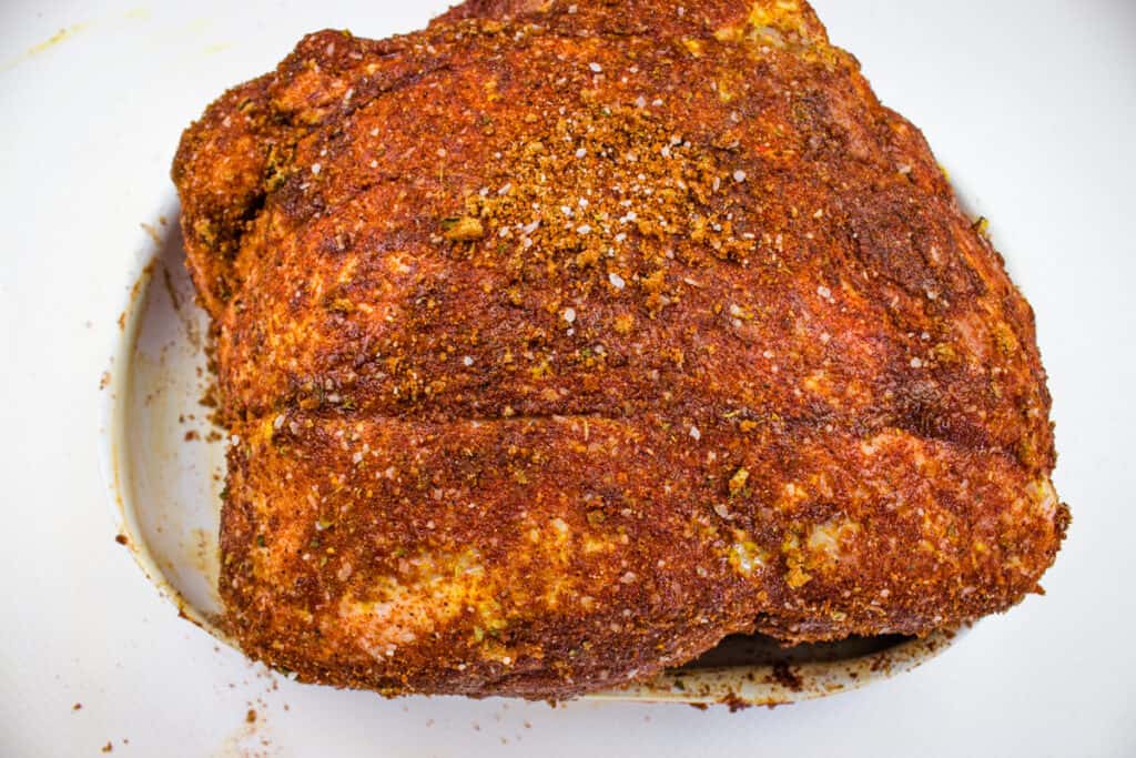 pork butt rubbed with spice mixture