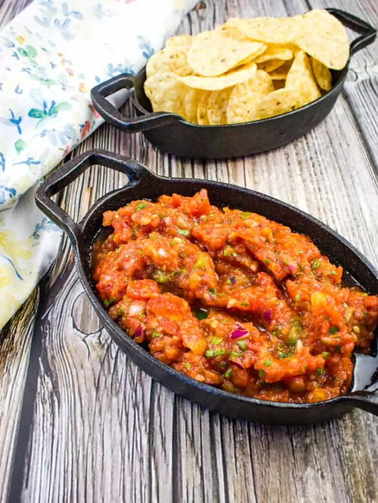 smoked tomato salsa in a black dish