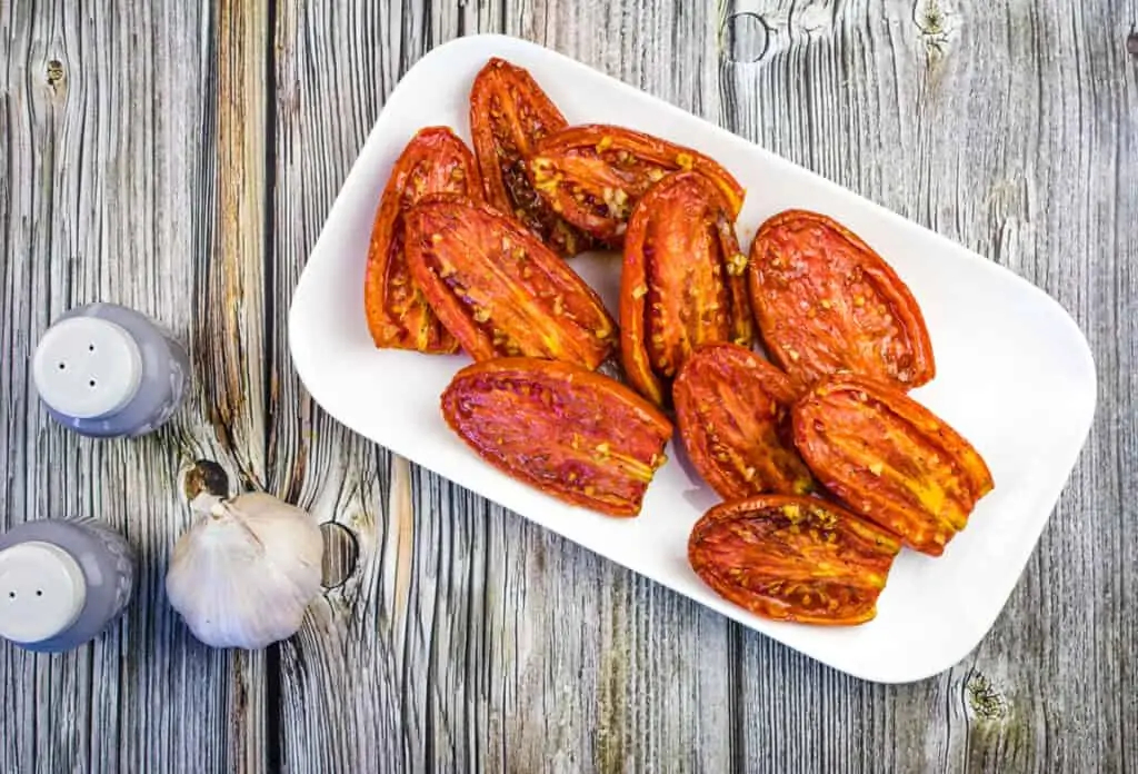 smoked tomatoes on a platter