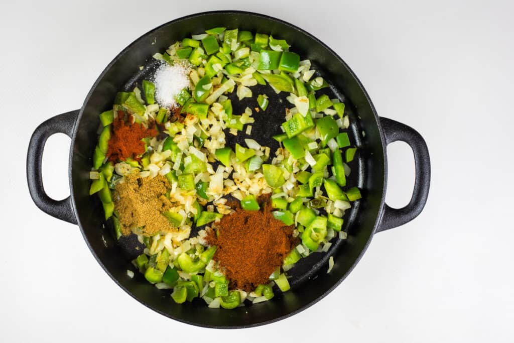 add spices to sauteed vegetables