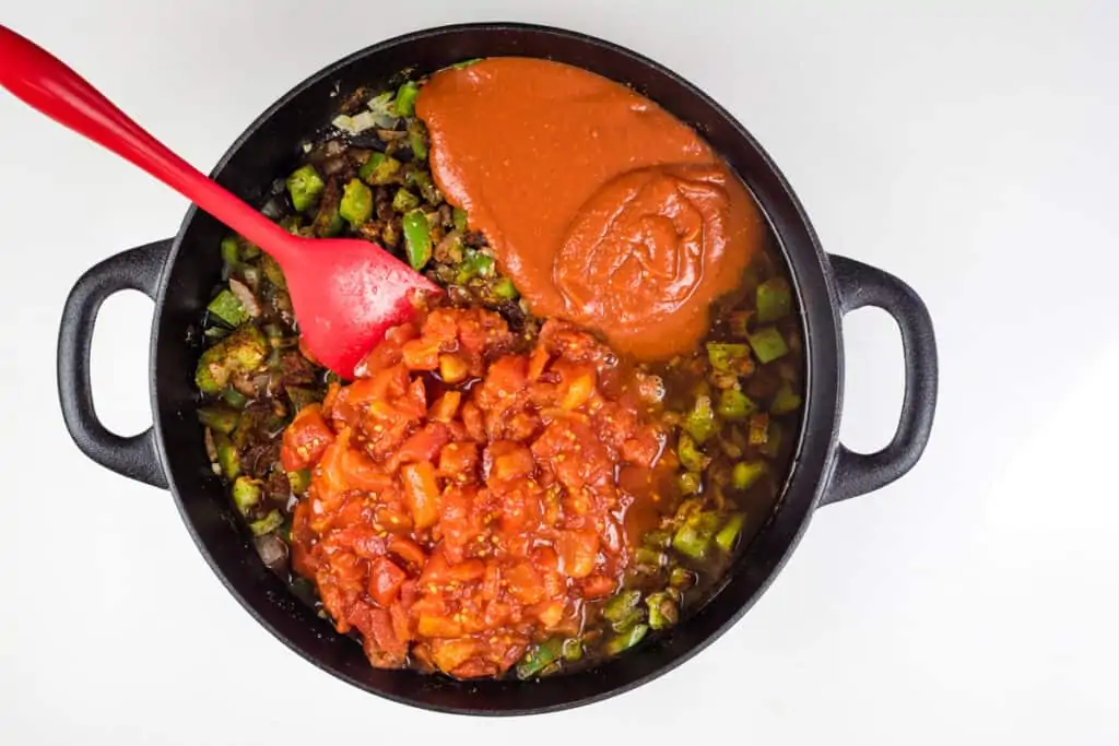 adding tomatoes to over the top chili reicpe