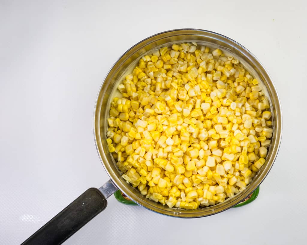 corn kernels added to sauce