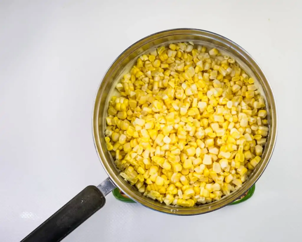 corn kernels added to sauce