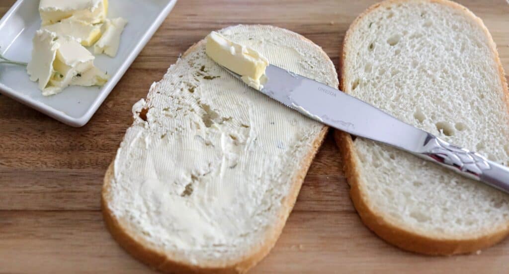 butter one side of the bread to make turkey & apple panini