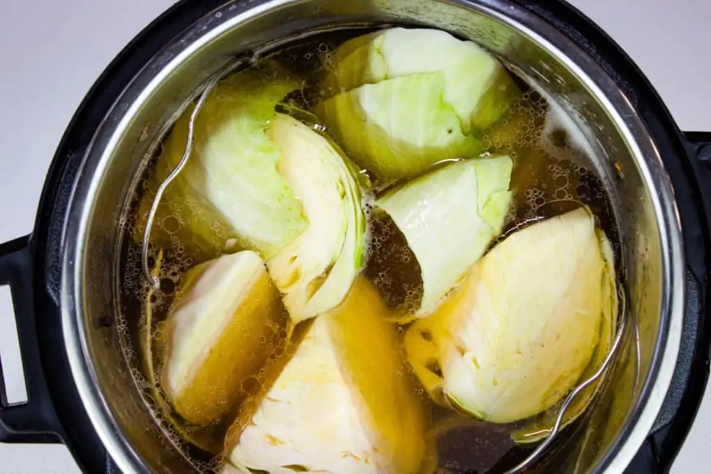 adding cabbage to the pot