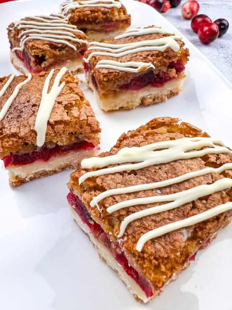 cranberry bars on a white platter