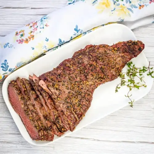 smoked tri tip on a plate