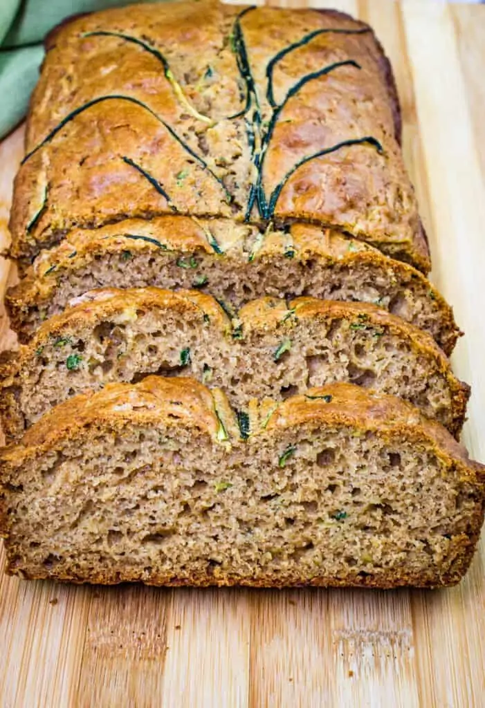 sliced zucchini bread on a cutting board