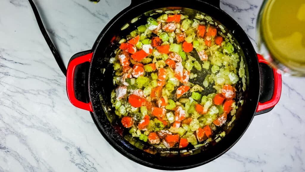sautee the veggies then add the wine and flour