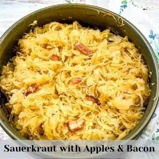 sauerkraut with apples and bacon in a serving dish
