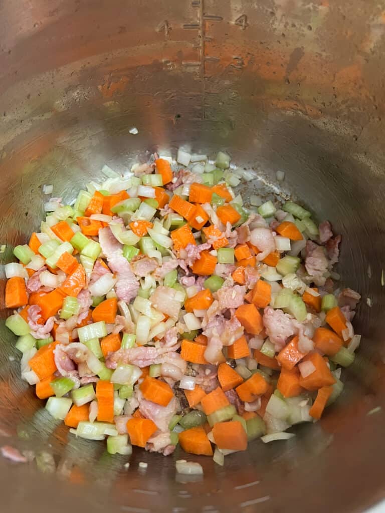 carrots, celery, and onion sauteing in the instant pot