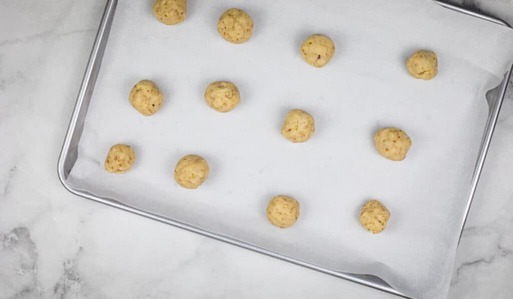 roll into balls and bake on parchment lined cookie sheet