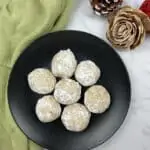 pecan butter ball cookies on a plate