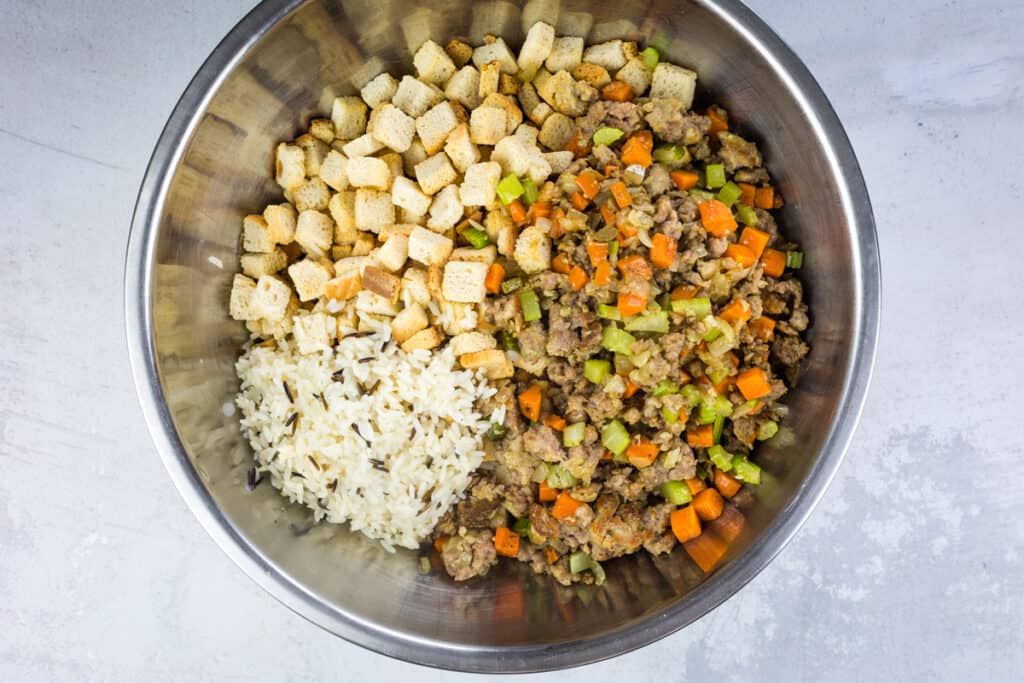 mix bread, rice, and veg mixture in a bowl.