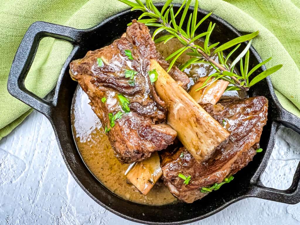 garlic braised short ribs on a plate
