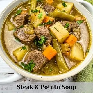 instant pot steak and potato soup in a bowl