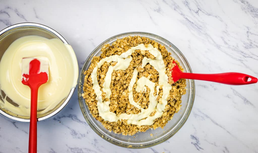 Mixing in the melted white chocolate.