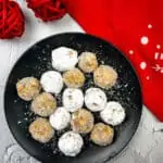 Serve the bourbon rum balls with white chocolate and enjoy!